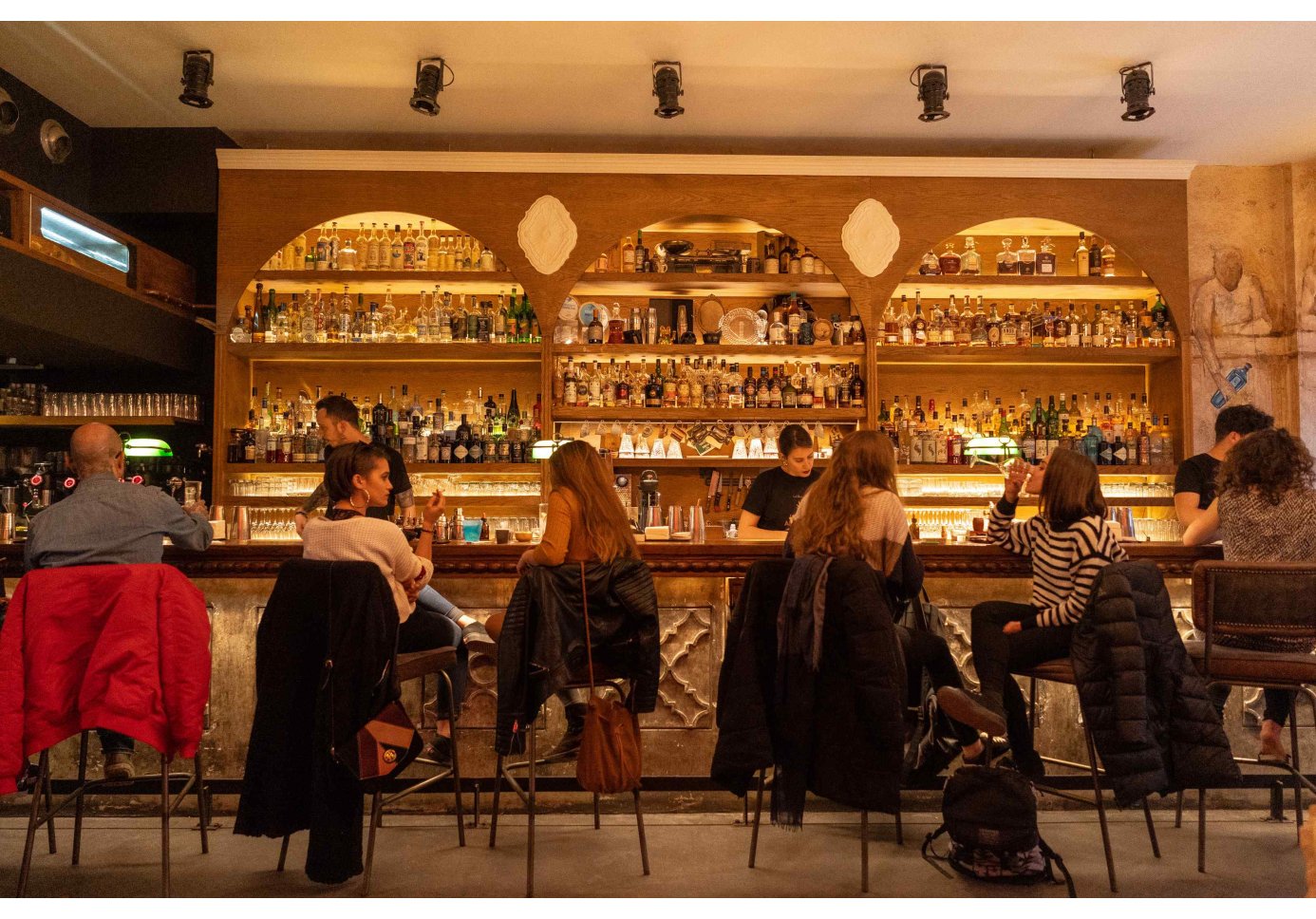 people sitting at a bar