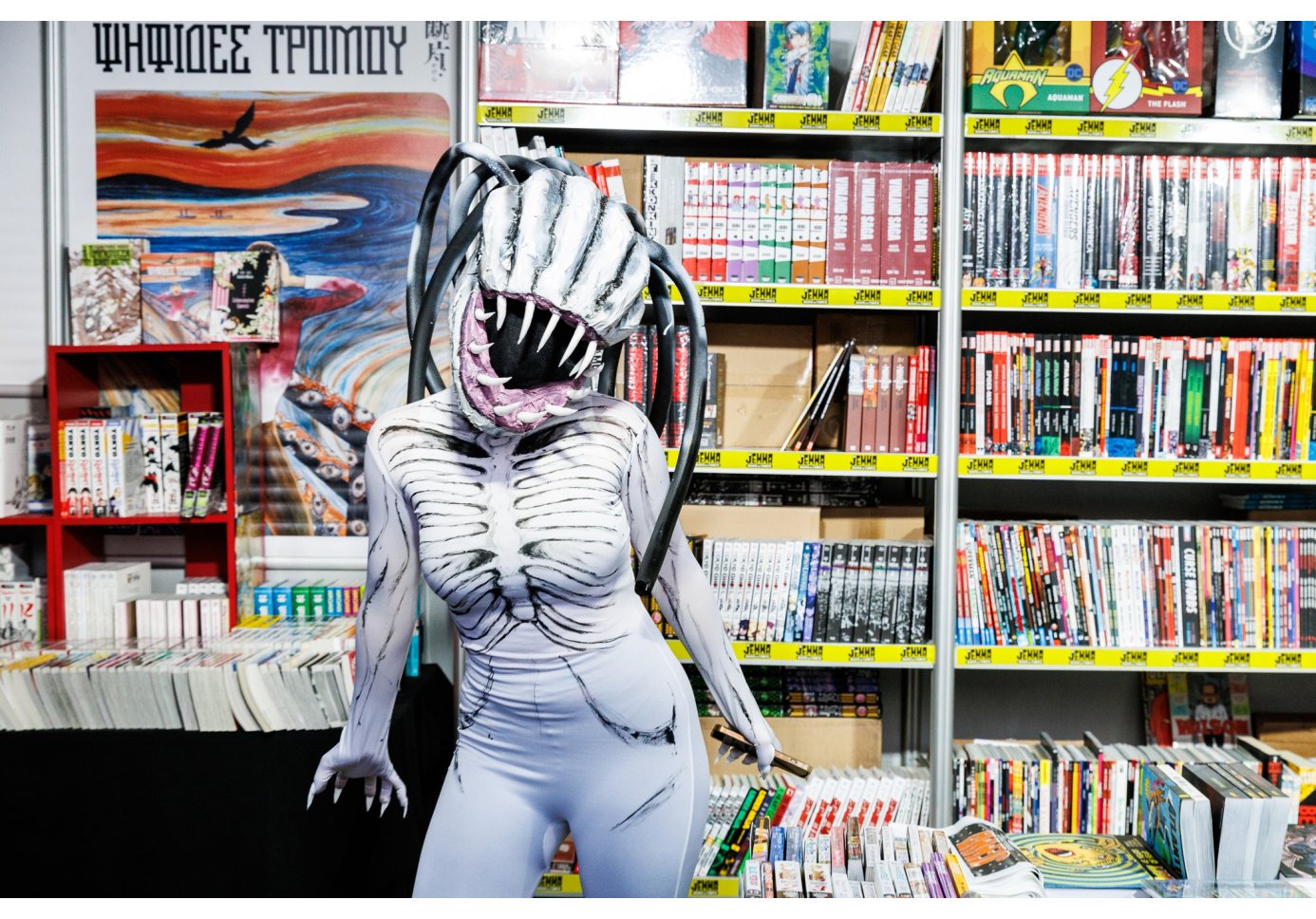 a cosplay costume in front of libraries full of comics