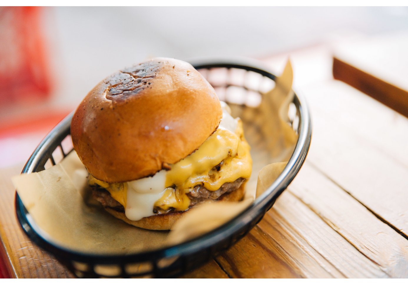 a burger served on a tray.